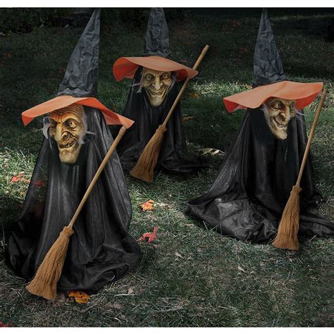 Transform your Halloween display with a witch figurine and sharp stakes